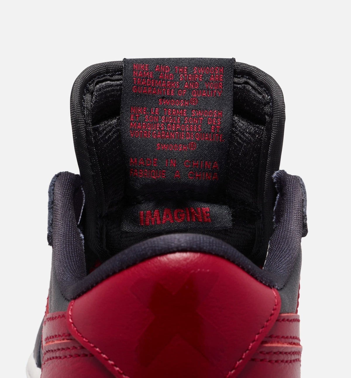 Air Jordan 1 Retro Low OG Banned | Grade School Lifestyle Shoe | Black/Varsity Red/Summit White