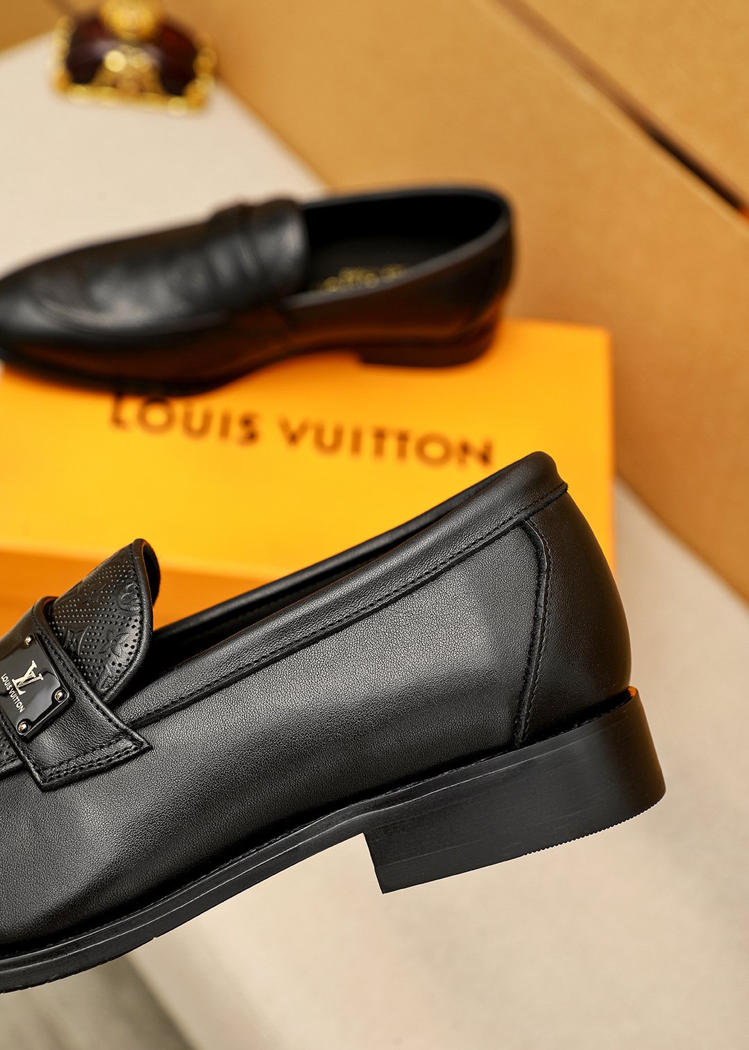 Louis Vuitton Men's Black Embossed Loafers - Rounded Toe